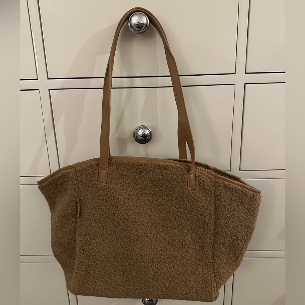 New/ unused. Neiman Marcus. Brown Shearling Tote Bag. 19 in. x 10.5 in.
